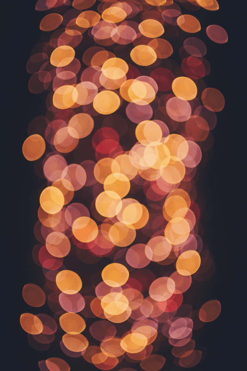 어두운 배경에 따뜻한 색상의 보케 조명, 마법 같은 추상 바탕화면.